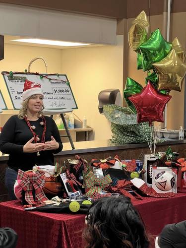 MADISON YOUTH CENTER AWARD Dec. 18, 2024 $1,200 Grant Award for Athletic Equipment Madison Youth Center Executive Director Mary Brousard Receives Award Nancy Leahy photograph